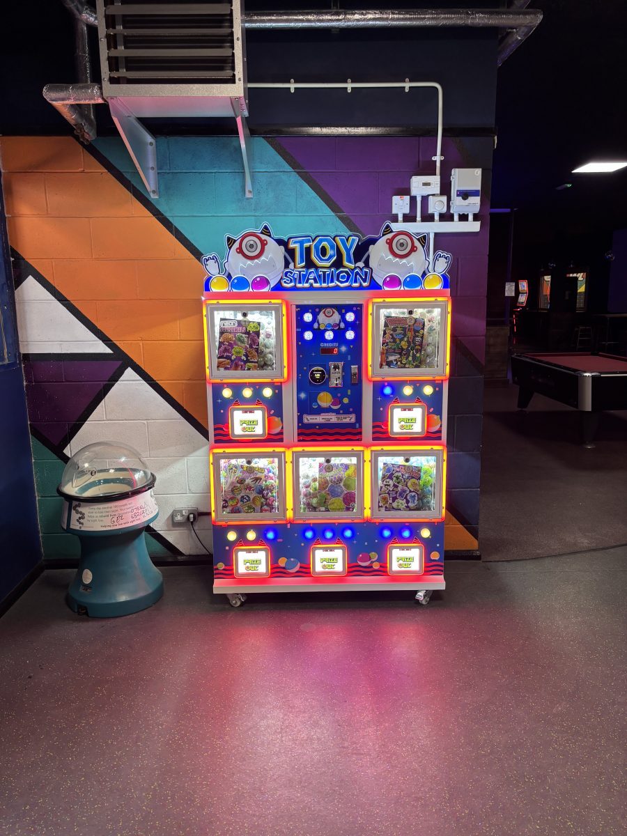 Toy vending machine for venues profit share