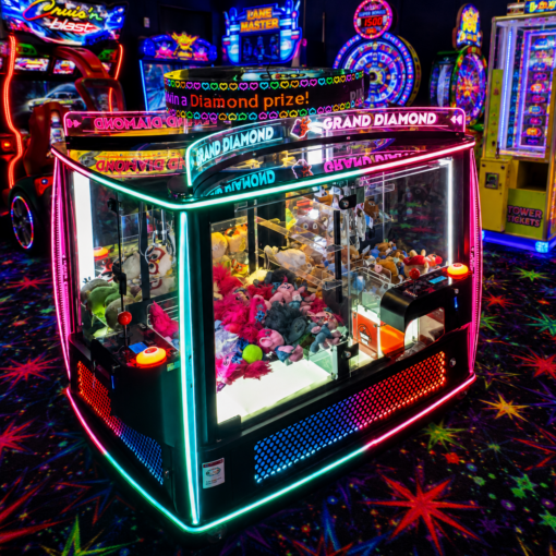 Neon-lit claw machine filled with plush toys in a colorful arcade, with 'Grand Diamond' signage above.